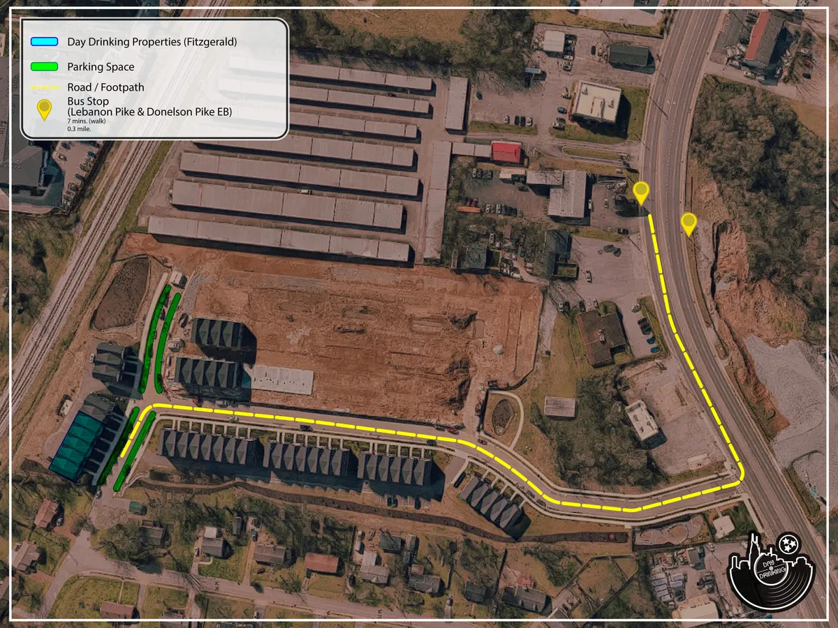 A practical exterior shot focusing on marked parking spaces in front of the Day Drinking Properties townhomes, with easy access to roads, bus stops, and walkways. The image underscores hassle-free parking and community connectivity.